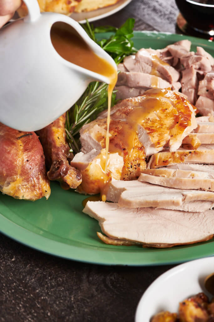 roasted turkey with gravy on a plate